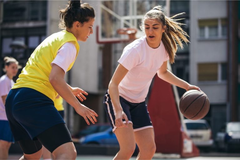 Girls playing basketball, putting them at risk for a cardiac emergency